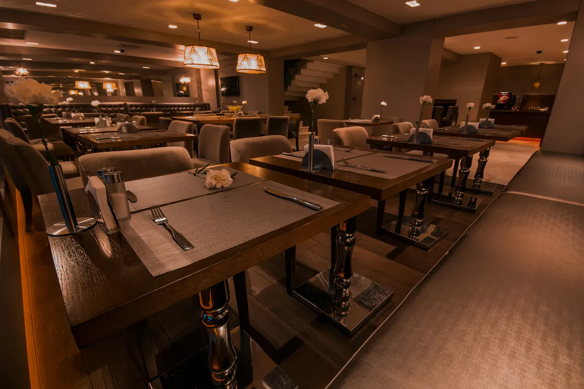 Elegant, softly lit restaurant dining room