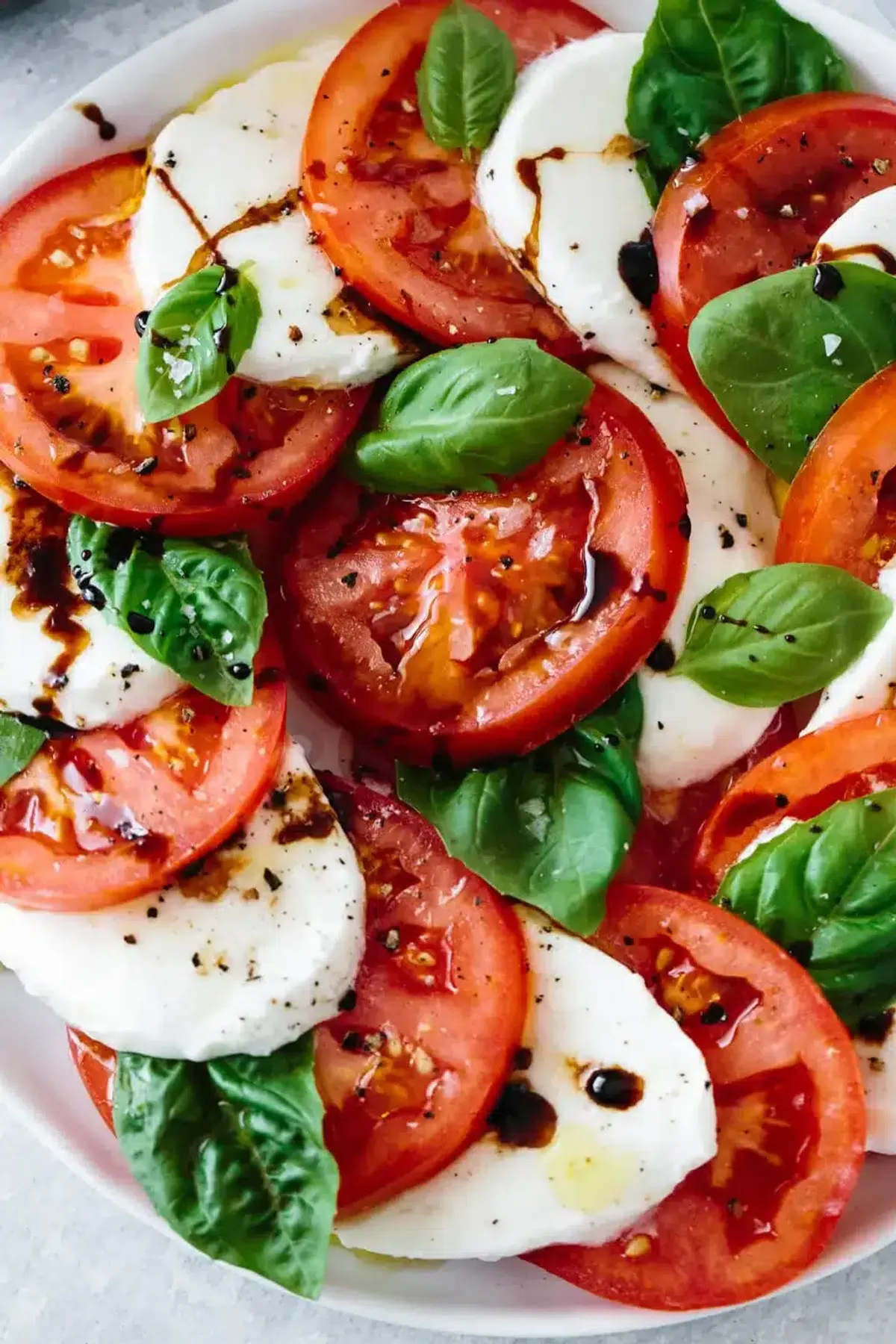 Holmes Beach Delight: The Feast’s Caprese Salad and Its Italian Roots
